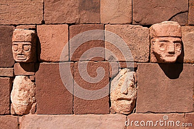 Wall of Tiahuanaco stone faces Stock Photo