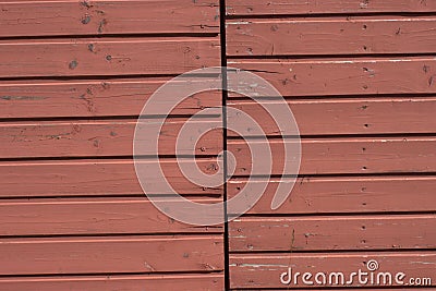 Wall of weathered, cracked, faded and split tongue and groove boards Stock Photo