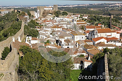 Walled citadel. whitewashed houses. Obidos. Portugal Stock Photo