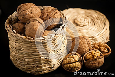 Wallnuts on a table in small baskets Stock Photo