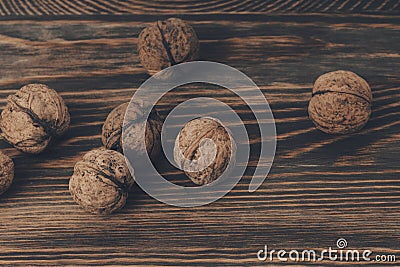 Wallnuts on wooden background . Vegan Protein concept Stock Photo