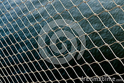 Wallpaper chain fence water metal pattern wallpaper Stock Photo