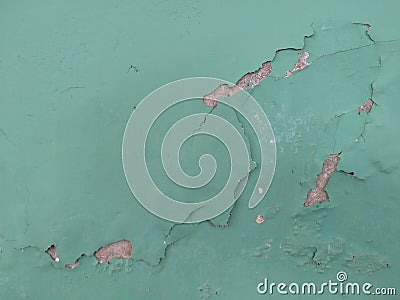 The walls are green with peeling paint, with stucco details Stock Photo