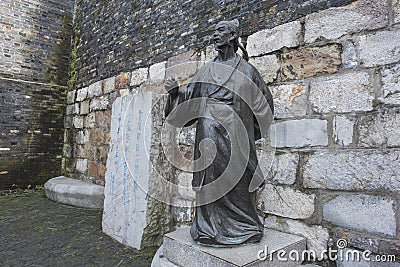 Walls plus poet stone statue Editorial Stock Photo