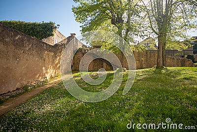 Walls and trees surrounding the Priory of La-CharitÃ©-sur-Loire, France Stock Photo