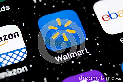 Walmart application icon on Apple iPhone X screen close-up. Walmart app icon. Walmart.com is multinational retailing corporation Editorial Stock Photo