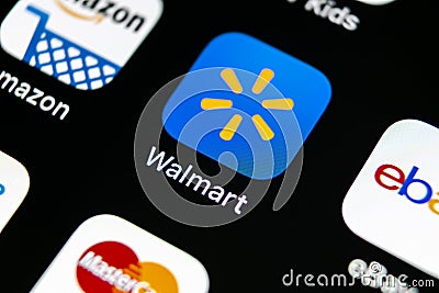 Walmart application icon on Apple iPhone X screen close-up. Walmart app icon. Walmart.com is multinational retailing corporation Editorial Stock Photo