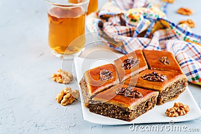 Walnut baklava with glasses of tea Stock Photo