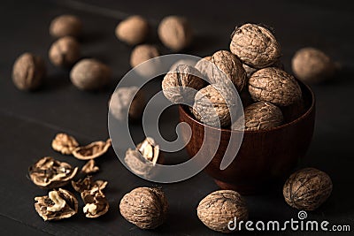 Walnut in wooden bowl Stock Photo