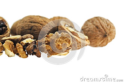 Walnuts and a cracked walnut Stock Photo