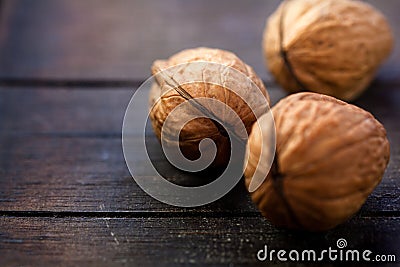 Walnuts on rustic wooden board Stock Photo