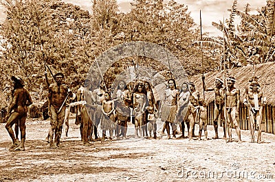 Dani people in village, Baliem Valley, Papua, Indonesia Editorial Stock Photo