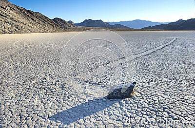 wandering rock, the racetrack, death valley , california. unexplained mysterious moving stone Stock Photo