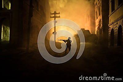 War Concept. Military silhouettes fighting scene on war fog sky background, World War Soldiers Silhouette Below Cloudy Skyline At Stock Photo