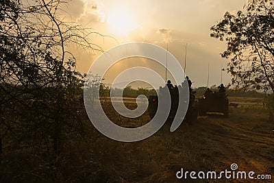 War Concept.Military silhouettes fighting scene on war fog sky background, Stock Photo