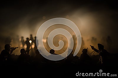 War Concept. Military silhouettes fighting scene on war fog sky background, World War Soldiers Silhouettes Below Cloudy Skyline At Stock Photo