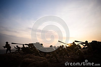 War Concept. Military silhouettes fighting scene on war fog sky background, World War Soldiers Silhouettes Below Cloudy Skyline At Stock Photo