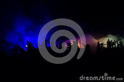 War Concept. Military silhouettes fighting scene on war fog sky background, World War Soldiers Silhouettes Below Cloudy Skyline At Stock Photo