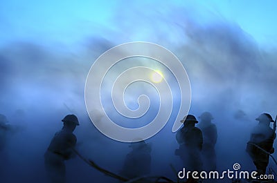 War Concept. Military silhouettes and tanks fighting scene on war fog sky background, World War Soldiers Silhouettes Below Cloudy Stock Photo