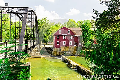 War Eagle Mill and War Eagle Bridge on the War Eagle River in Rogers, Arkansas Editorial Stock Photo