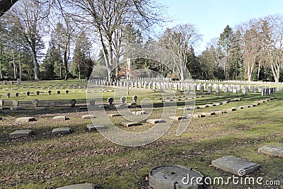 War graves from the First World War in Cologne's southern cemetery. Standardized weathered tombstones . Editorial Stock Photo