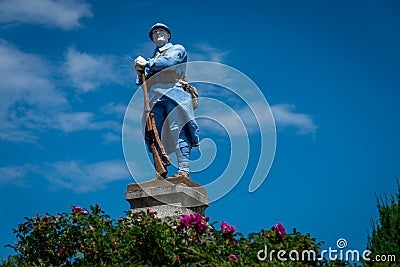 War memorial for the men lost in the first world war, statue of a blue soldier. lozere , France Editorial Stock Photo