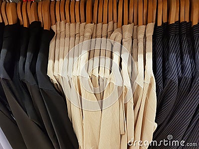 Wardrobe full of shirts with different colours Stock Photo