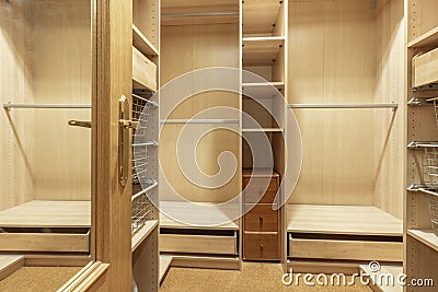 Wardrobe interior with its wooden divisions and bars Stock Photo