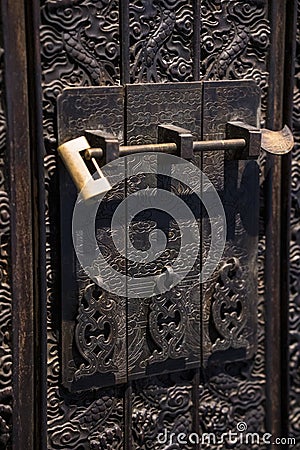The wardrobe is locked by the iron lock Editorial Stock Photo