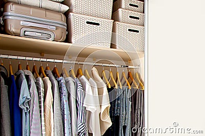 Wardrobe with perfect order clothes shades. Copy space Stock Photo