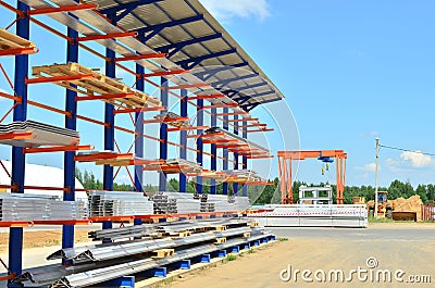 Warehouse Cantilever Racking Systems for storage Aluminum Pipe or profiles. Pallet Rack and Industrial Warehouse Racking. Stock Photo