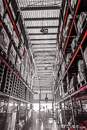 Warehouse cargo building store, warehouse interior with shelves, pallets and boxes for stock and sorting shipment goods in freight Stock Photo