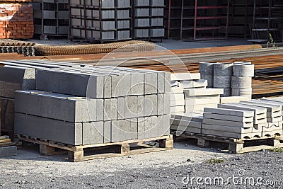 Warehouse cinder block and products from cement slurry on the base. Stock Photo