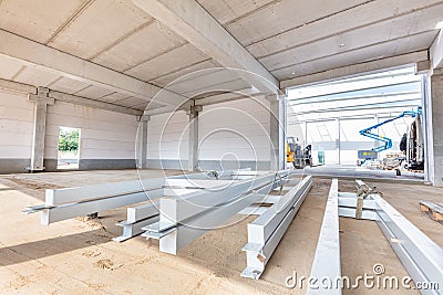 Warehouse construction site and steel profiles. Industrial building Stock Photo