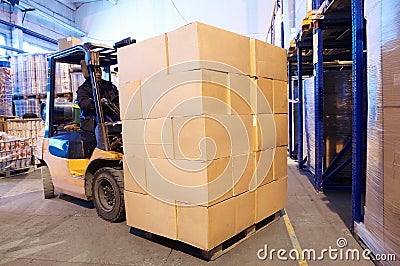 Warehouse forklift loader worker Stock Photo