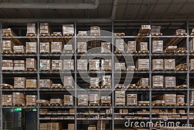 Warehouse interior with shelves rack for keep production material, pallets and boxes Stock Photo