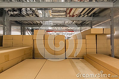 Warehouse interior with shelves rack for keep production material, pallets and boxes Stock Photo