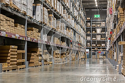 Warehouse interior with shelves rack for keep production material, pallets and boxes Stock Photo