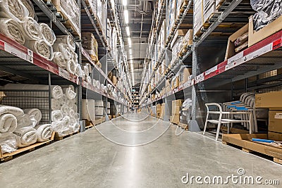 Warehouse interior with shelves rack for keep production material, pallets and boxes Stock Photo