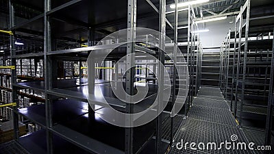 Warehouse, large logistics commerce structure. Creative. Large metal shelves at a modern warehouse, industrial warehouse Stock Photo