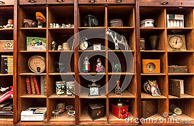 Warehouse of lost things, many vintage toys, retro souvenirs, coffee grinders in old house Editorial Stock Photo