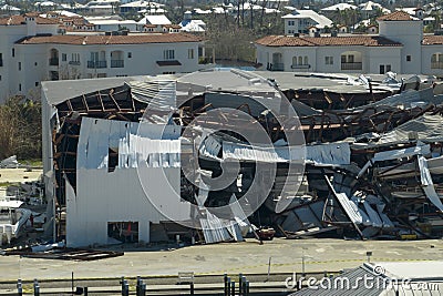 Warehouse with motorboats and yachts destroyed by hurricane winds in Florida coastal area. Natural disaster and its Editorial Stock Photo