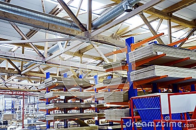 Warehouse of particle boards or chipboards materail for support the furniture manufacturers. Production room Stock Photo