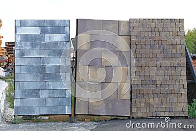 Warehouse paving slabs for laying road construction. Pavement tiles at construction site. Construction of sidewalks Stock Photo