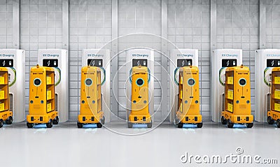 Warehouse robots charge with electric charging stations Stock Photo