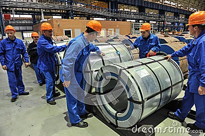 Warehouse steel coils of sheet steel Editorial Stock Photo