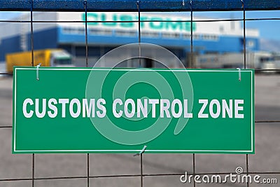 Warehouse storage of goods behind sign, customs control area. Stock Photo