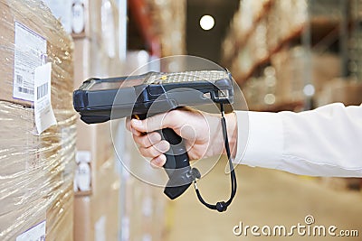 Warehouse worker hand with scanner Stock Photo