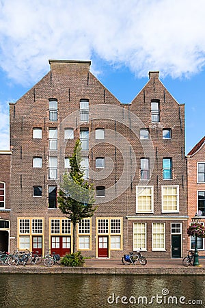 Warehouses on Old Rhine canal in Leiden, Netherlands Editorial Stock Photo
