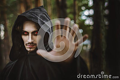 Warlock pointing finger Stock Photo